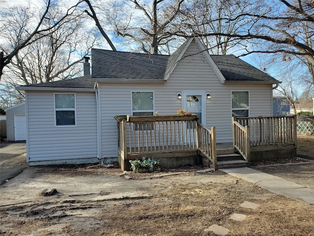 view of front of home featuring a wooden deck