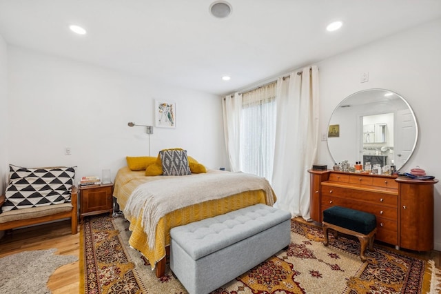 bedroom with light hardwood / wood-style flooring