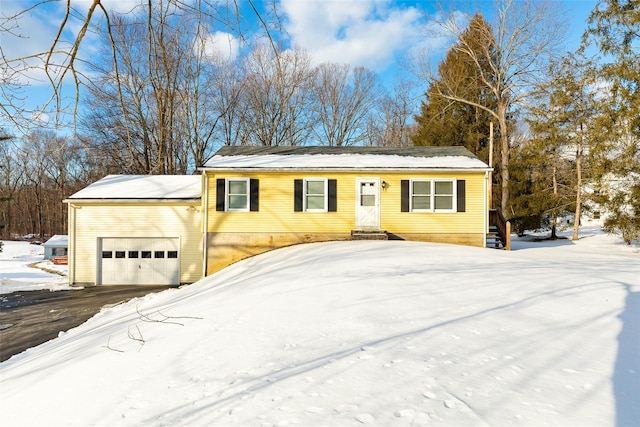 view of front of home featuring a garage