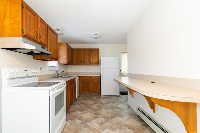 kitchen with sink, a textured ceiling, white appliances, and baseboard heating