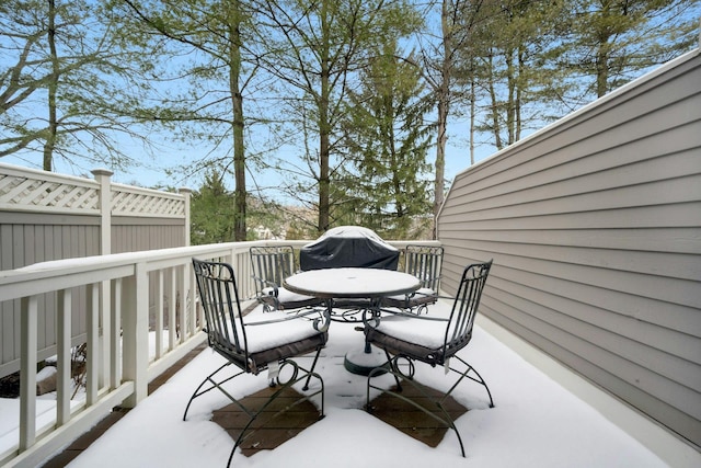 view of snow covered deck