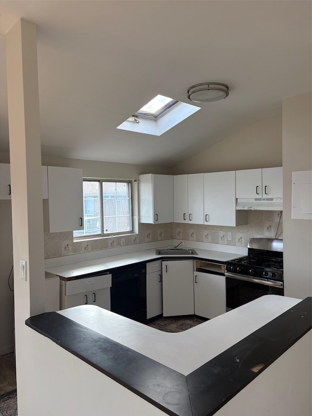 kitchen featuring vaulted ceiling with skylight, range with gas cooktop, dishwasher, sink, and white cabinets