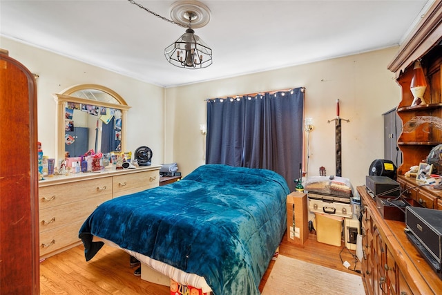 bedroom with light wood-type flooring