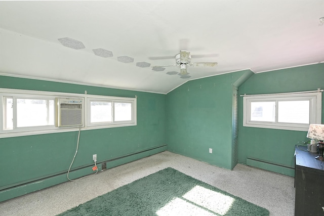 additional living space featuring vaulted ceiling, a wall unit AC, ceiling fan, and baseboard heating