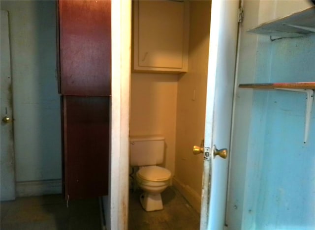 bathroom featuring toilet