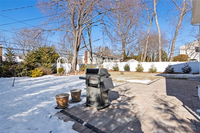 view of snow covered patio