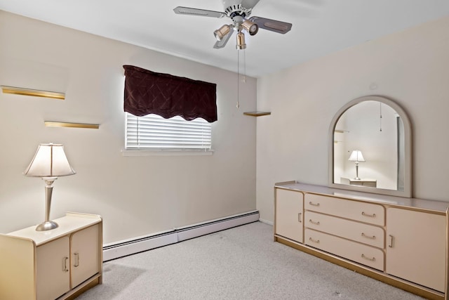 bedroom featuring a baseboard radiator and light carpet