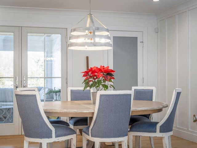155 Pinewood Rd, Cutchogue, NY 11935 - dining space with french doors and wood finished floors