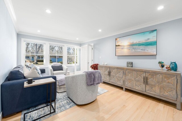155 Pinewood Rd, Cutchogue, NY 11935 - living room with recessed lighting, ornamental molding, and wood finished floors