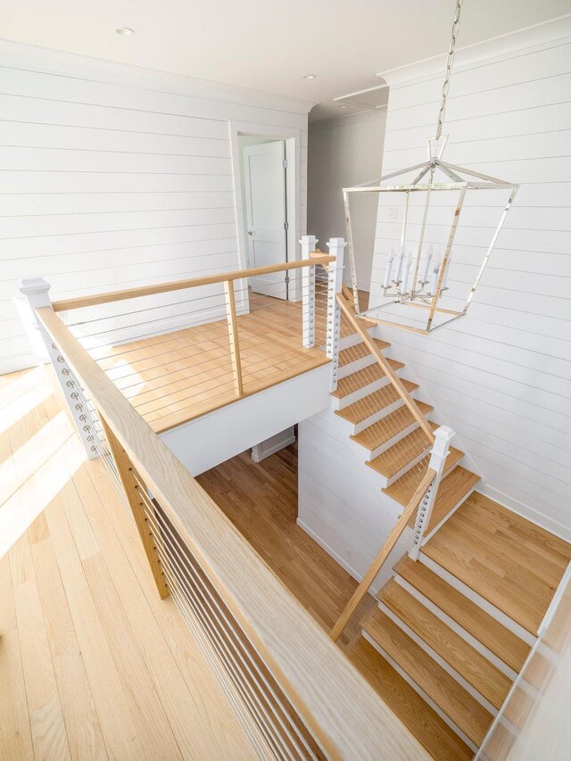 155 Pinewood Rd, Cutchogue, NY 11935 - stairs with wood finished floors and wooden walls