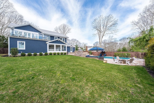 155 Pinewood Rd, Cutchogue, NY 11935 - view of yard with a fenced in pool, a fenced backyard, and a patio area