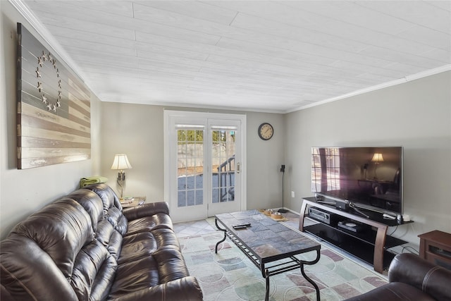 living room featuring crown molding