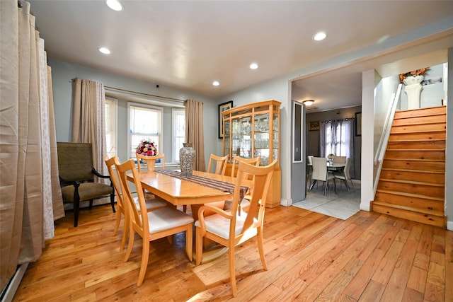 dining room with light hardwood / wood-style floors