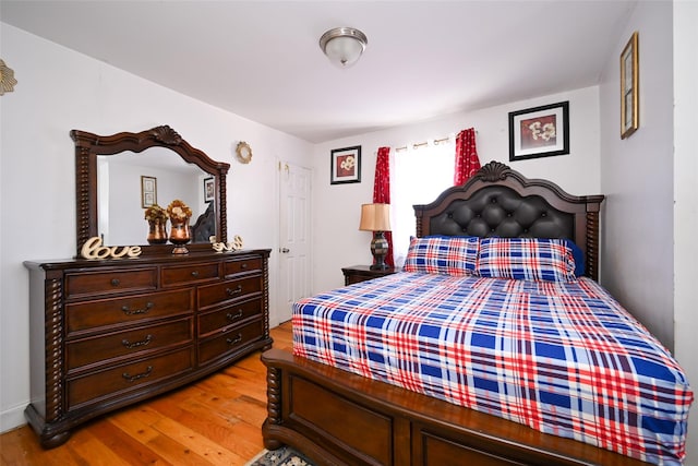 bedroom featuring light wood-type flooring