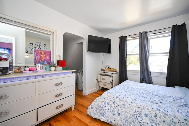 bedroom with light hardwood / wood-style floors