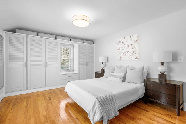 bedroom with hardwood / wood-style floors