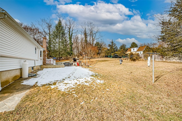 view of yard featuring a wooden deck