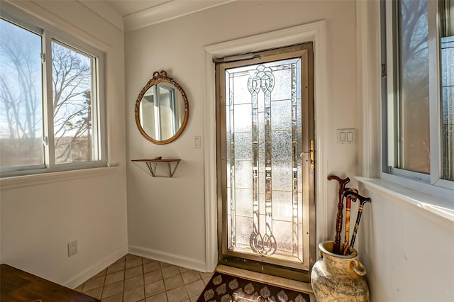 entryway with tile patterned floors