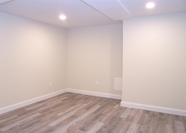 unfurnished room featuring light hardwood / wood-style floors