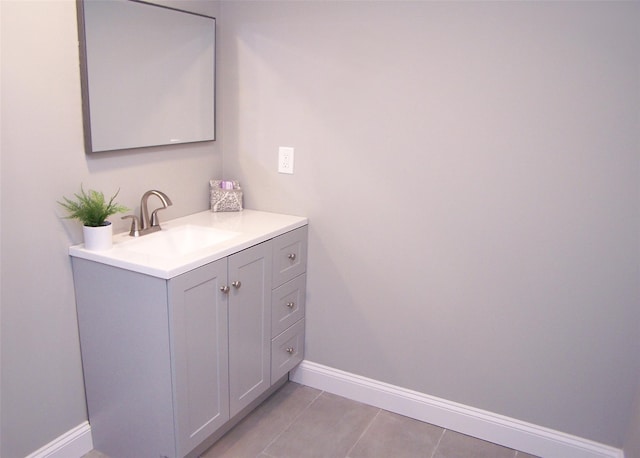 bathroom with vanity and tile patterned flooring