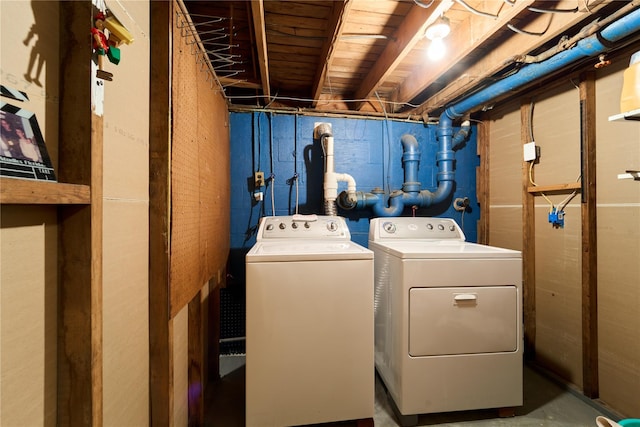 washroom featuring washer and dryer