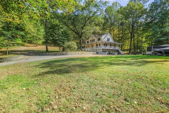 view of yard featuring a porch