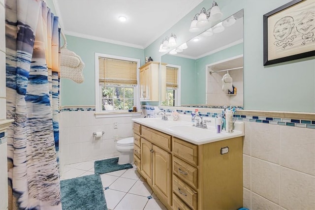 bathroom with tile walls, vanity, ornamental molding, tile patterned floors, and toilet