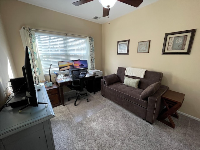 office area with light carpet and ceiling fan