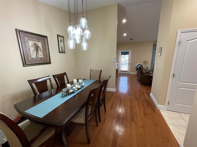 dining area featuring light wood-type flooring