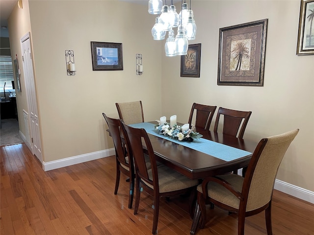 dining space featuring hardwood / wood-style floors