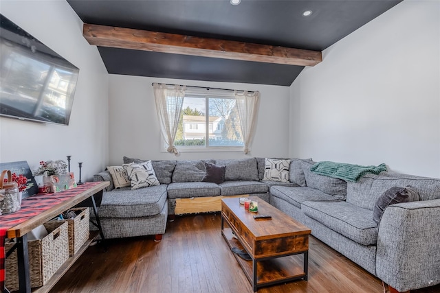 living room featuring hardwood / wood-style flooring and lofted ceiling with beams