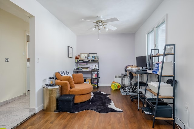 office space with ceiling fan and hardwood / wood-style floors