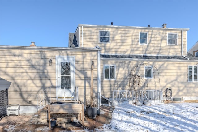 view of snow covered property