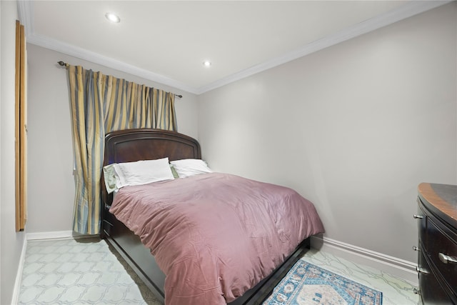 bedroom with ornamental molding