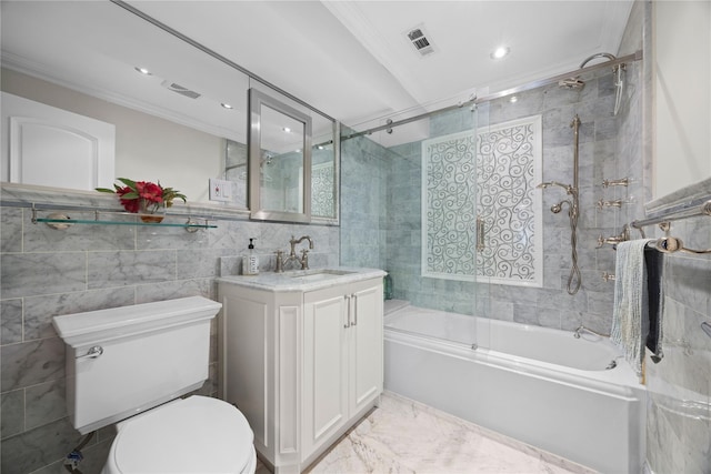 full bathroom with toilet, combined bath / shower with glass door, crown molding, tile walls, and vanity