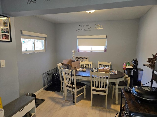 dining room featuring light wood-type flooring