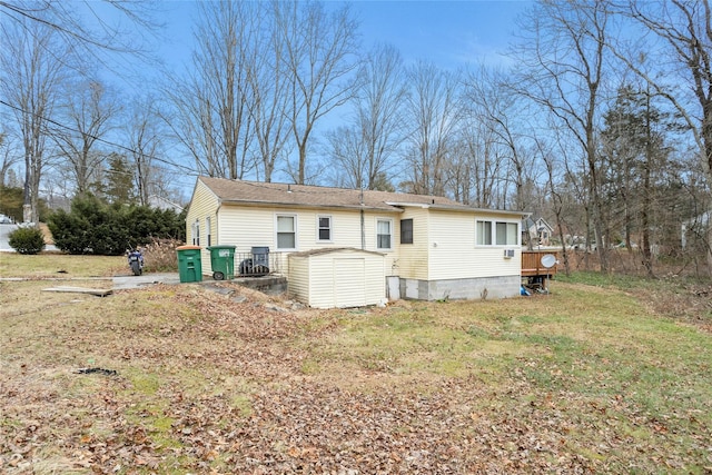 back of house with a yard