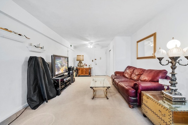 living room featuring carpet floors and ceiling fan