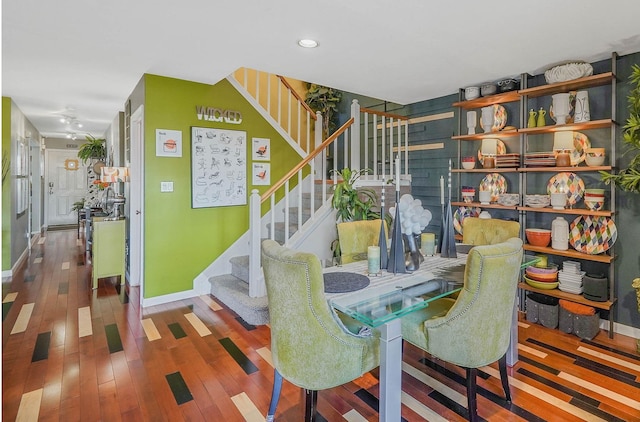 dining area with hardwood / wood-style floors