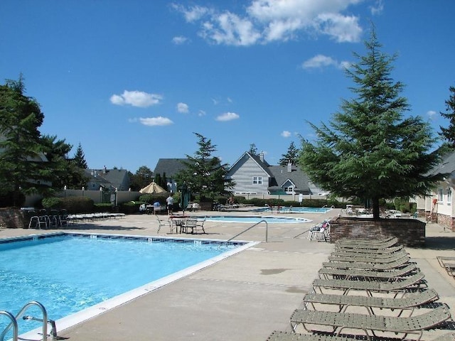 view of pool featuring a patio area