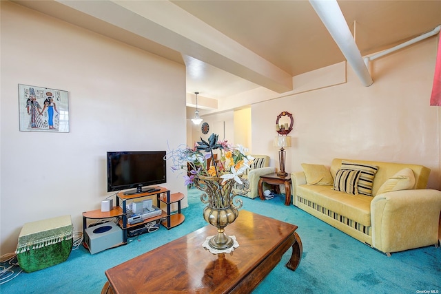 living room with beamed ceiling and carpet