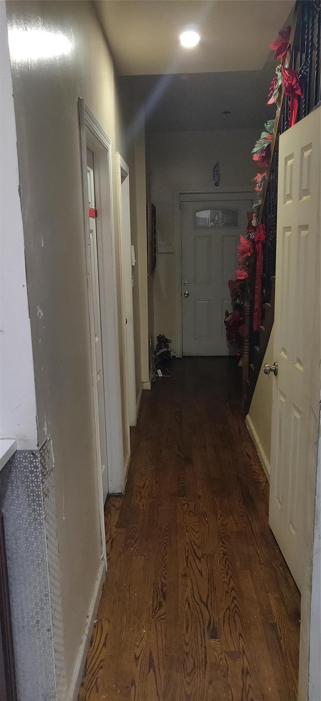 hallway featuring hardwood / wood-style flooring