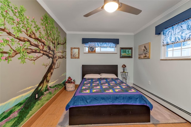 bedroom with multiple windows, a baseboard heating unit, ornamental molding, and ceiling fan