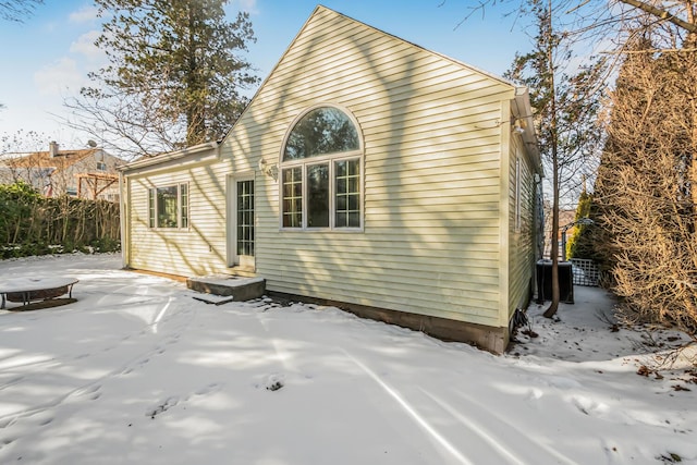 view of snow covered property