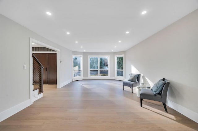 sitting room with light hardwood / wood-style floors