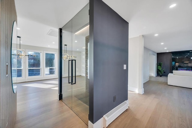 hallway featuring light hardwood / wood-style floors