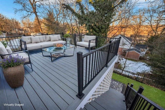 wooden terrace featuring outdoor lounge area