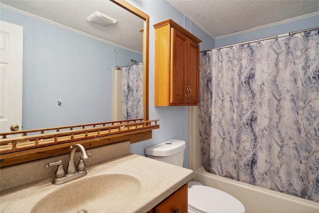 full bathroom featuring toilet, a textured ceiling, ornamental molding, vanity, and shower / bath combo with shower curtain