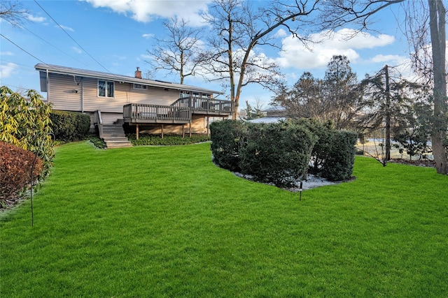 view of yard with a deck