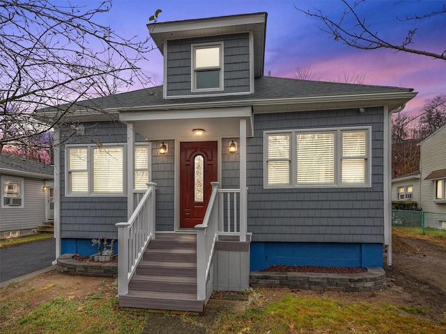 view of front of home featuring cooling unit